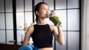 A diverse group of fitness enthusiasts performing functional strength and cardio training at a modern gym facility in Bhopal.